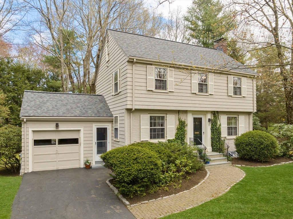 17 Roberts Road Wellesley, MA 02481 - Photo 3 of 34 a front view of a house with garden