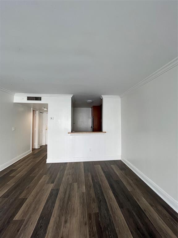 492 Northwest 165th Street Miami, FL 33169 - Photo 13 of 27 a view of empty room with wooden floor