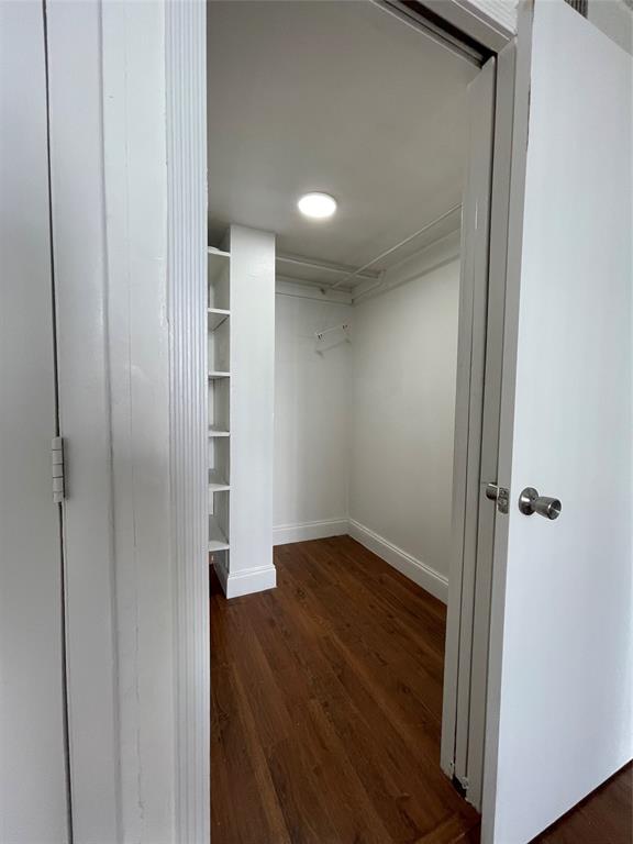 492 Northwest 165th Street Miami, FL 33169 - Photo 17 of 27 a view of hallway with wooden floor