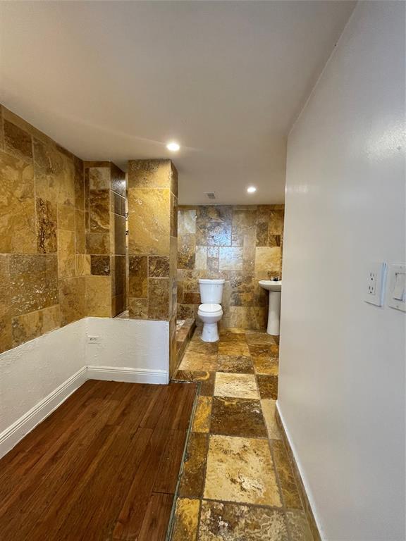 492 Northwest 165th Street Miami, FL 33169 - Photo 21 of 27 a bathroom with a bathtub and a shower