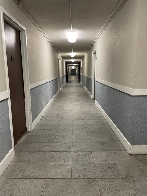 492 Northwest 165th Street Miami, FL 33169 - Photo 22 of 27 a view of a hallway