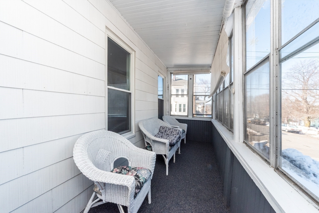 85 Beacon Street Clinton, MA 01510 - Photo 17 of 39 a living room with furniture and a large window