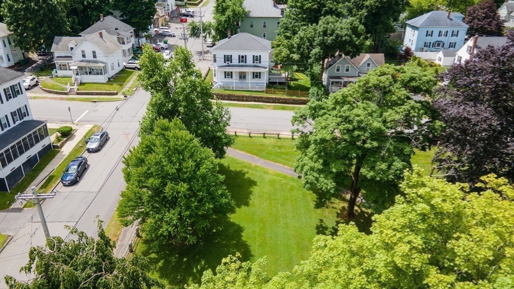 85 Beacon Street Clinton, MA 01510 - Photo 2 of 39 an aerial view of residential houses with yard and swimming pool