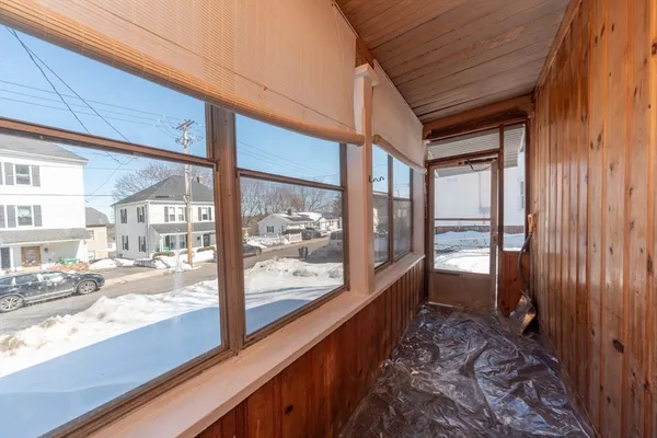 a view of a glass door with a balcony