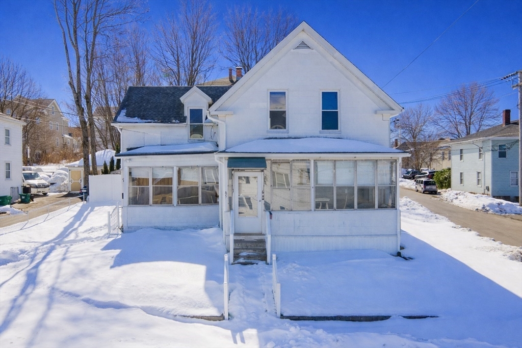 85 Beacon Street Clinton, MA 01510 - Photo 32 of 39 a front view of a house with a yard