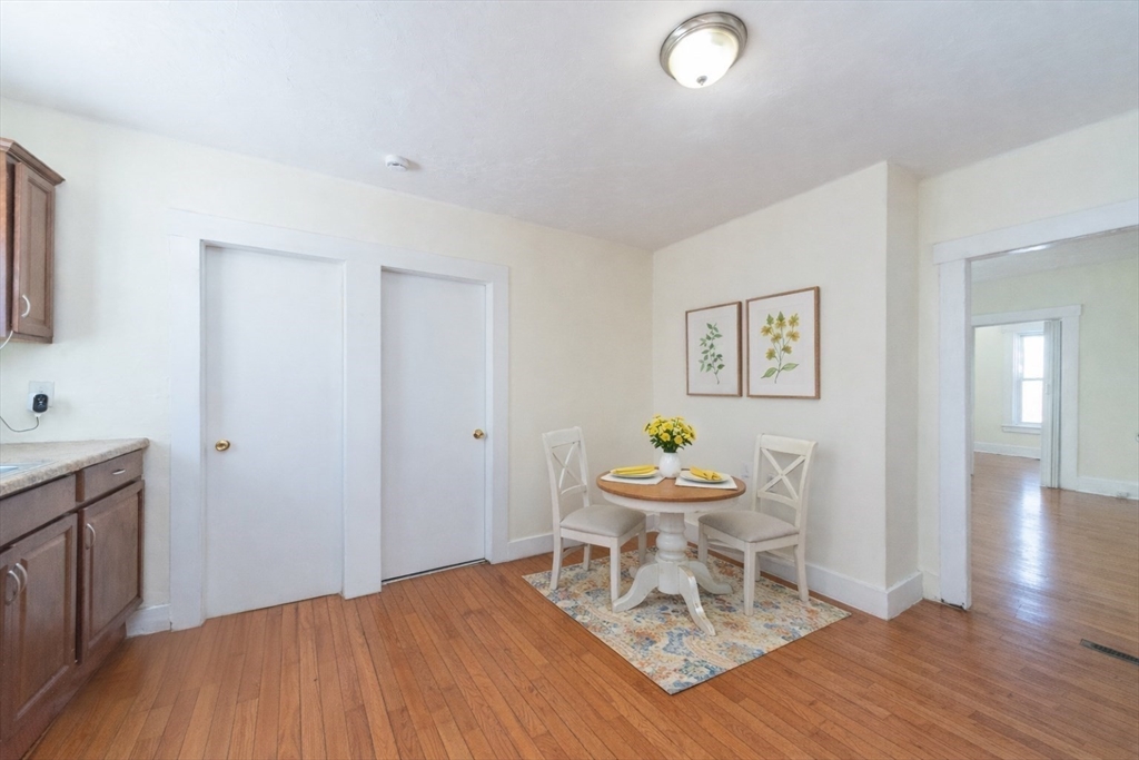 85 Beacon Street Clinton, MA 01510 - Photo 6 of 39 a living room with a sink and a wooden floor