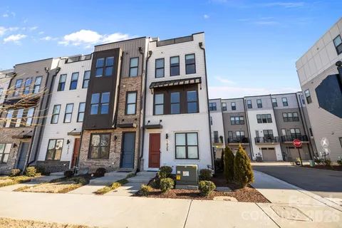 a front view of a building with street view
