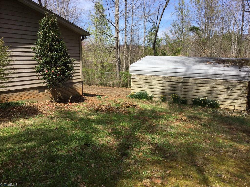 1027 Old Wagon Road King, NC 27021 - Photo 5 of 35 detached carport for parking and storage