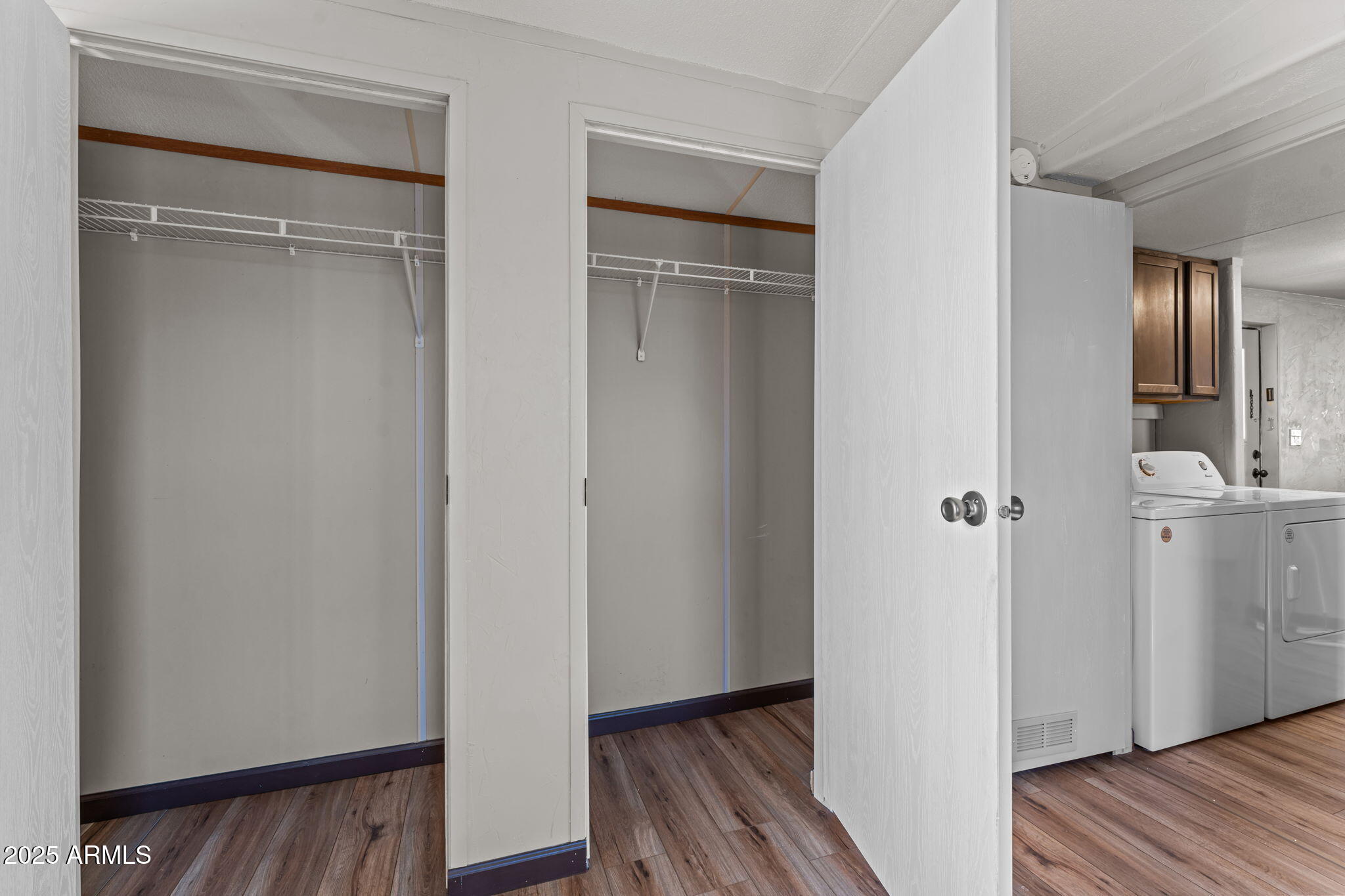 21199 West Escapee Way Congress, AZ 85332 - Photo 11 of 23 a view of a room with wooden floor