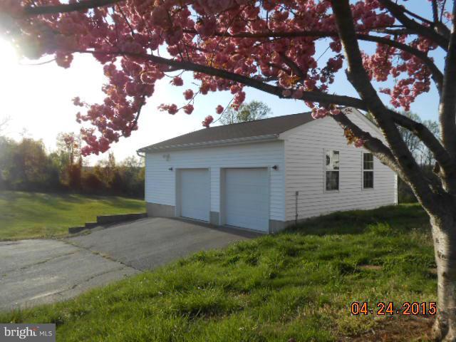 1350 Plum Point Road Huntingtown, MD 20639 - Photo 2 of 7 a backyard of a house with lots of green space