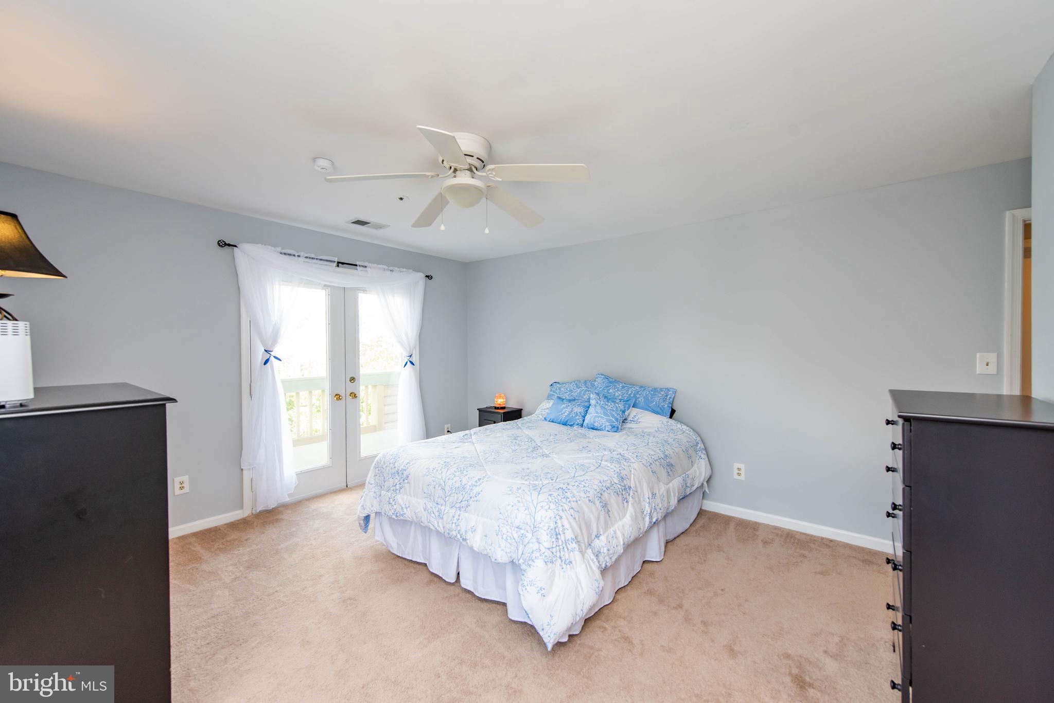 7902 Crows Nest Court, Unit 345 Laurel, MD 20707 - Photo 14 of 35 Owners Bed w/ceiling fan, fresh paint