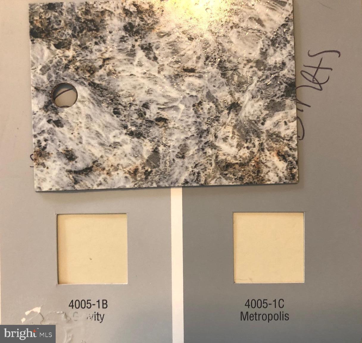 7902 Crows Nest Court, Unit 345 Laurel, MD 20707 - Photo 34 of 35 Counter sample next to wall & cabinet colors