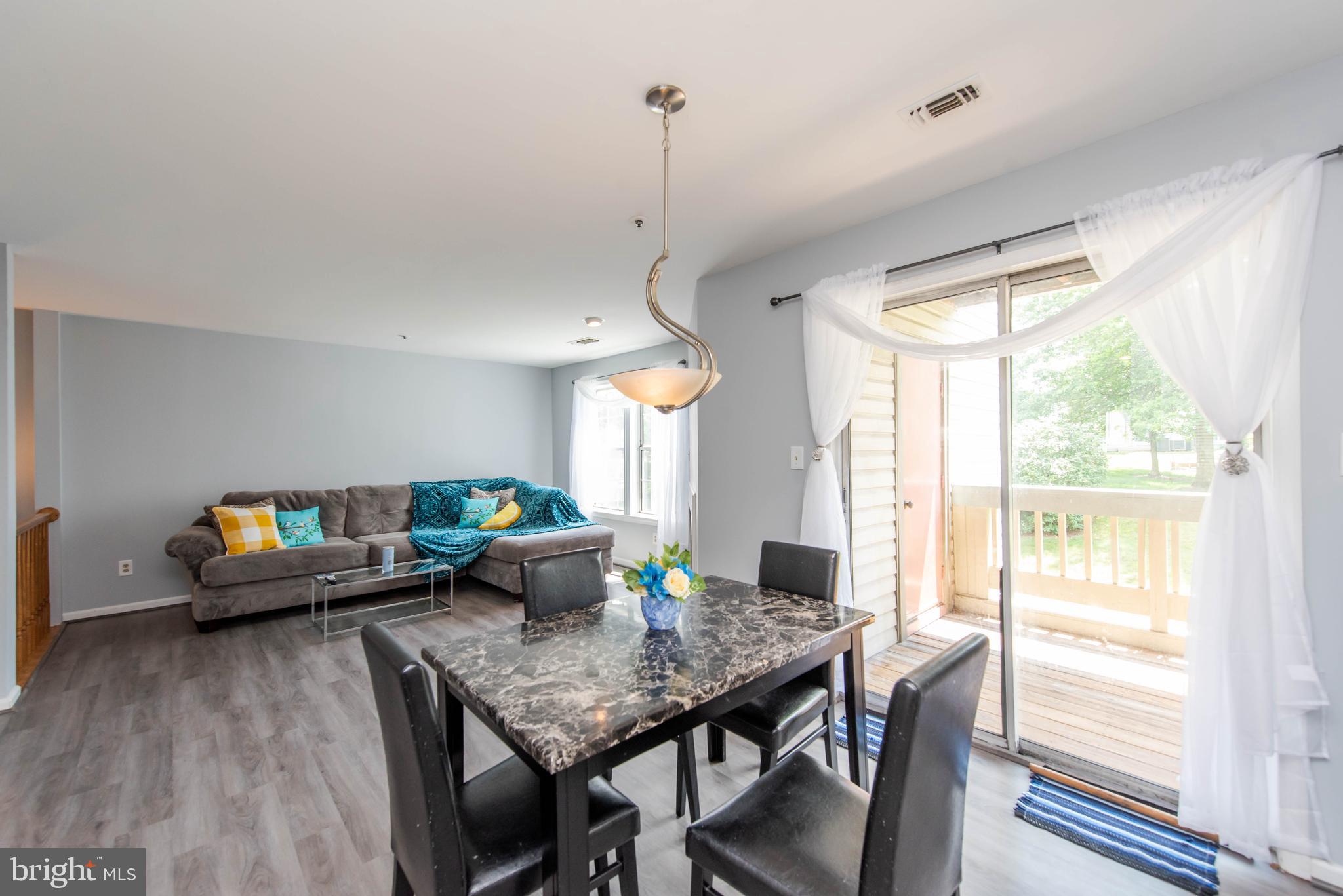 7902 Crows Nest Court, Unit 345 Laurel, MD 20707 - Photo 7 of 35 Dining Area w/slider to balcony