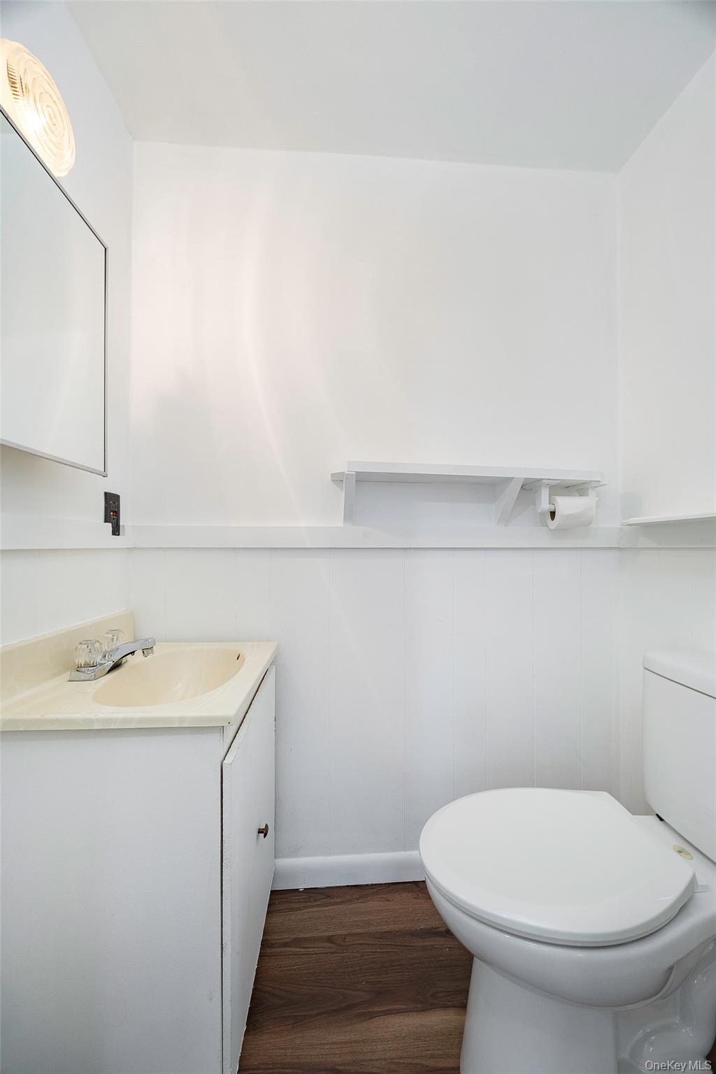 82 Lake Road Pine Plains, NY 12567 - Photo 12 of 38 a bathroom with a toilet a sink and mirror