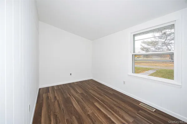 a view of a room that has a window