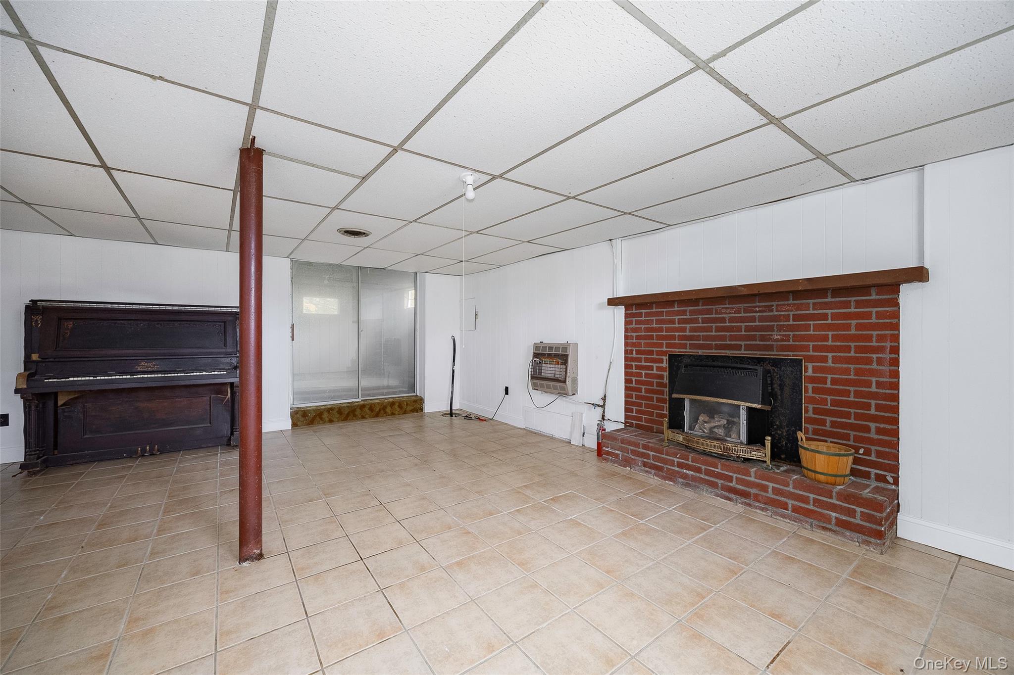 82 Lake Road Pine Plains, NY 12567 - Photo 22 of 38 a view of a livingroom with a fireplace