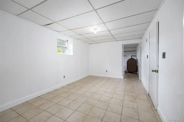 a view of a room with white walls