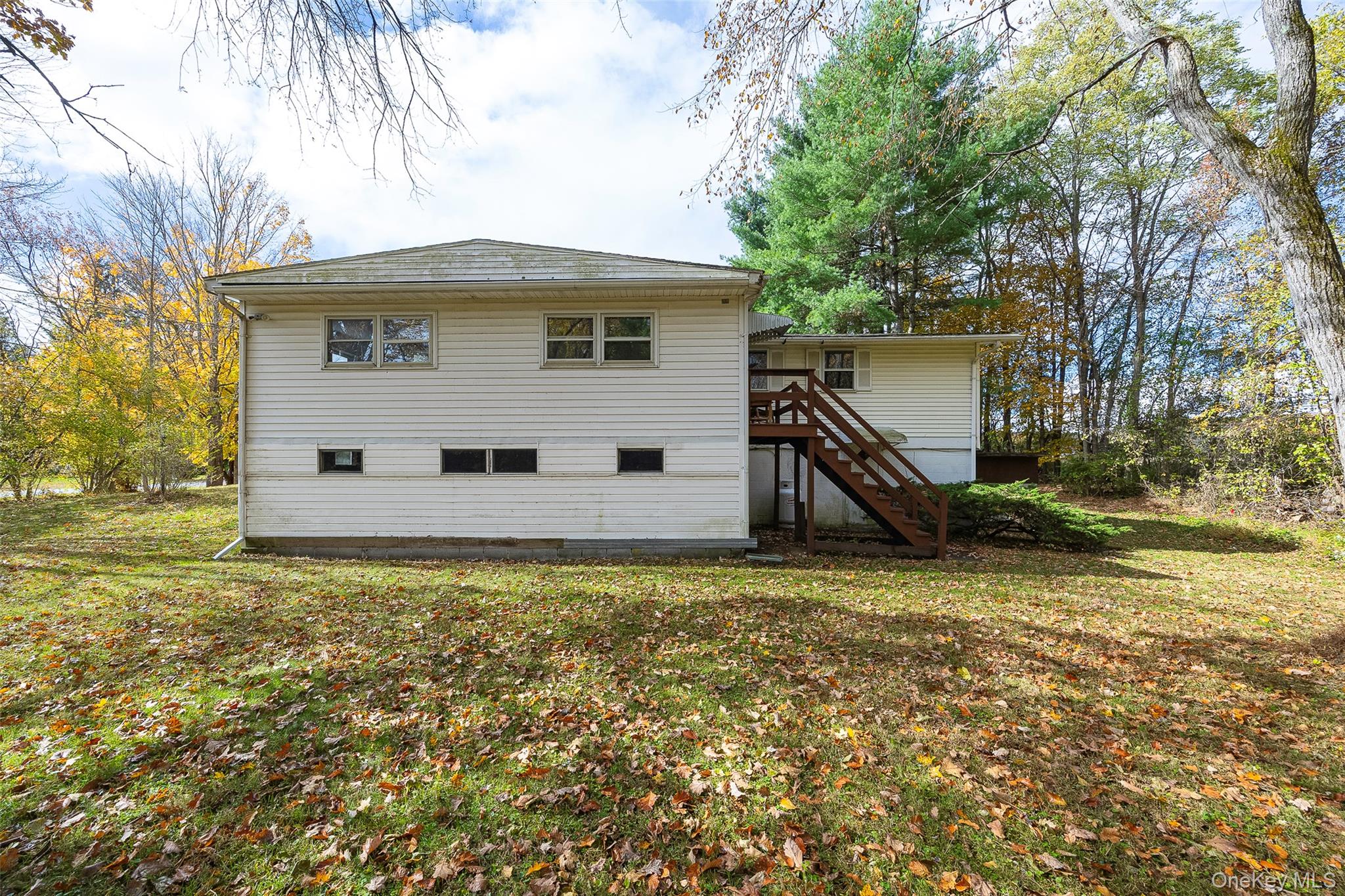 82 Lake Road Pine Plains, NY 12567 - Photo 3 of 38 a view of a house with a yard