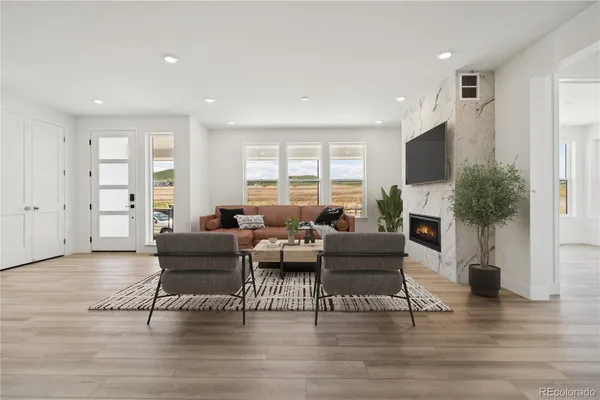 an empty room that has a large window