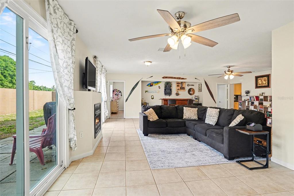 4105 Spring Way Circle Valrico, FL 33596 - Photo 18 of 34 a living room with furniture and a flat screen tv