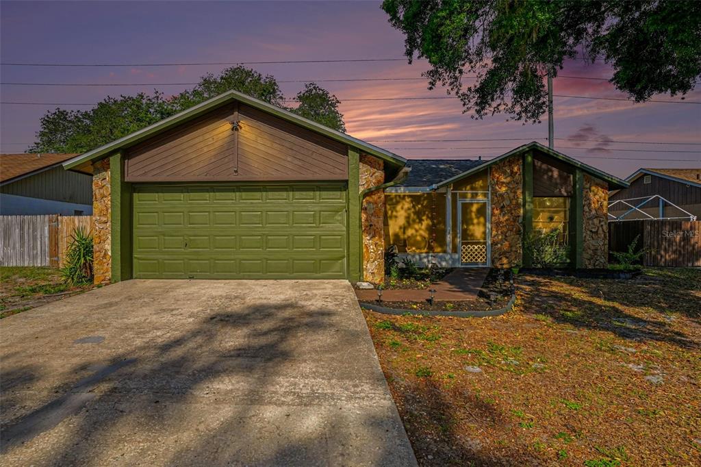 4105 Spring Way Circle Valrico, FL 33596 - Photo 2 of 34 a view of a house with a yard