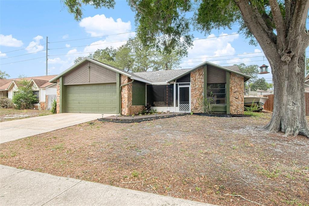 4105 Spring Way Circle Valrico, FL 33596 - Photo 3 of 34 a view of a house with a yard
