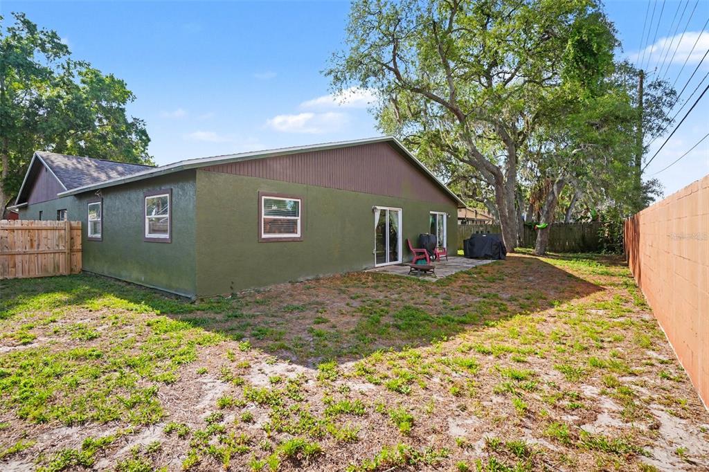 4105 Spring Way Circle Valrico, FL 33596 - Photo 33 of 34 a view of a house with backyard and tree