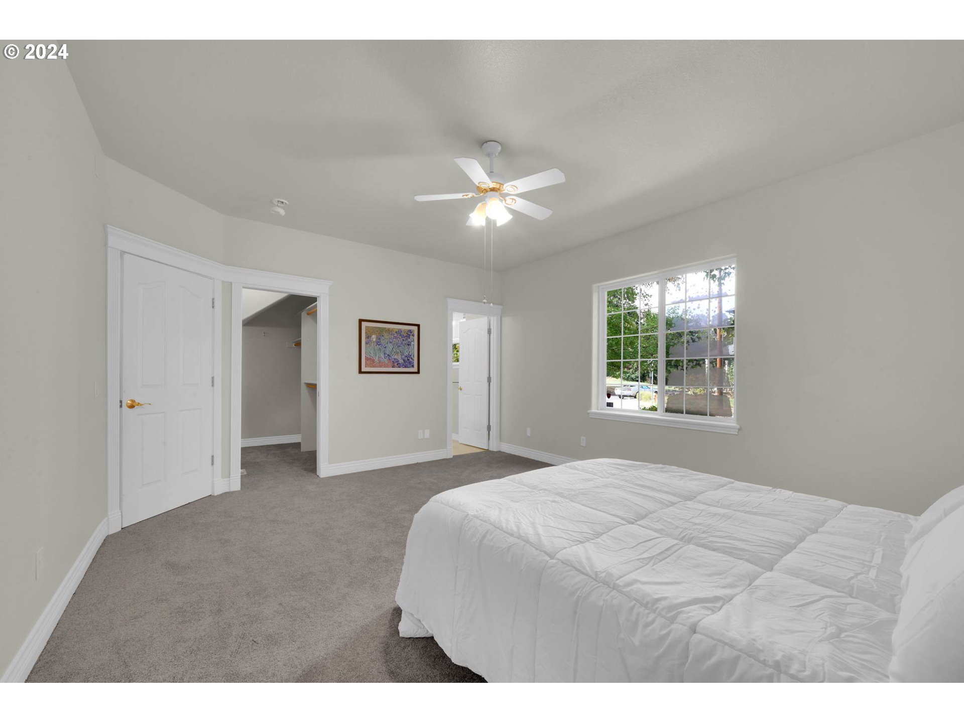 1480 Walnut Road Springfield, OR 97477 - Photo 16 of 48 a bedroom with a bed and a chandelier