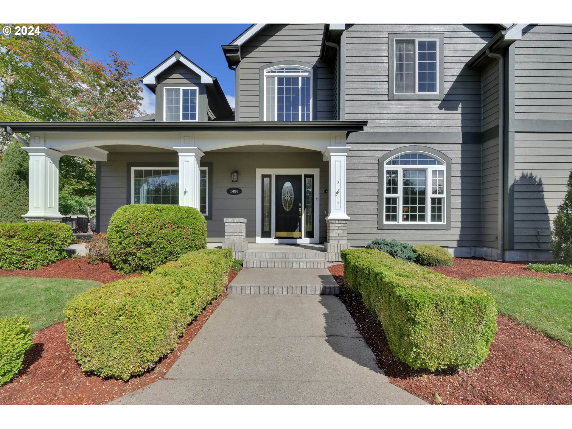 1480 Walnut Road Springfield, OR 97477 - Photo 2 of 48 a view of a house with a small yard and plants