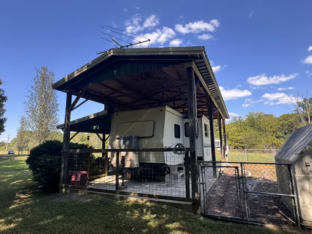 a view of a chairs and tables in the patio
