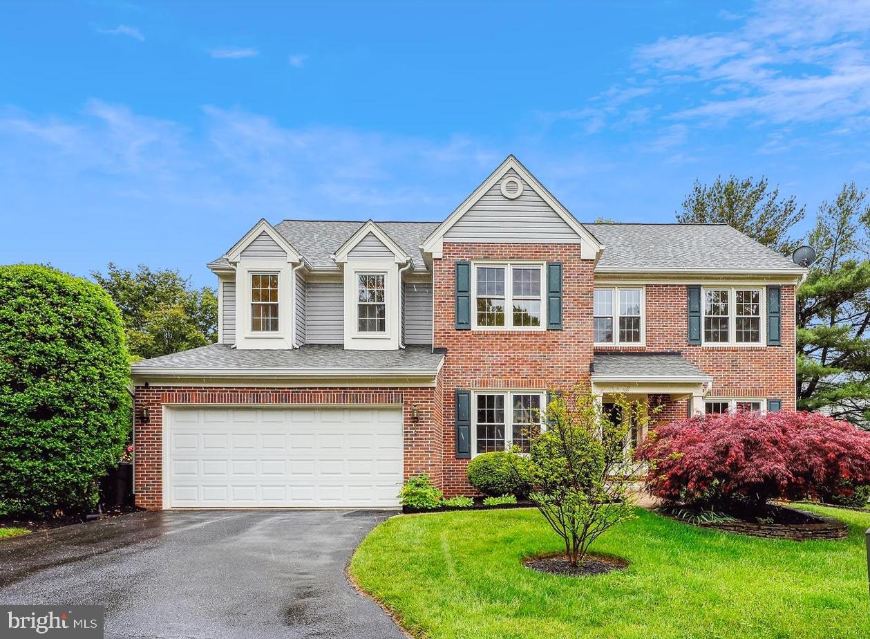 18717 Severn Road Gaithersburg, MD 20879 - Photo 1 of 44 a front view of a house with a garden and plants