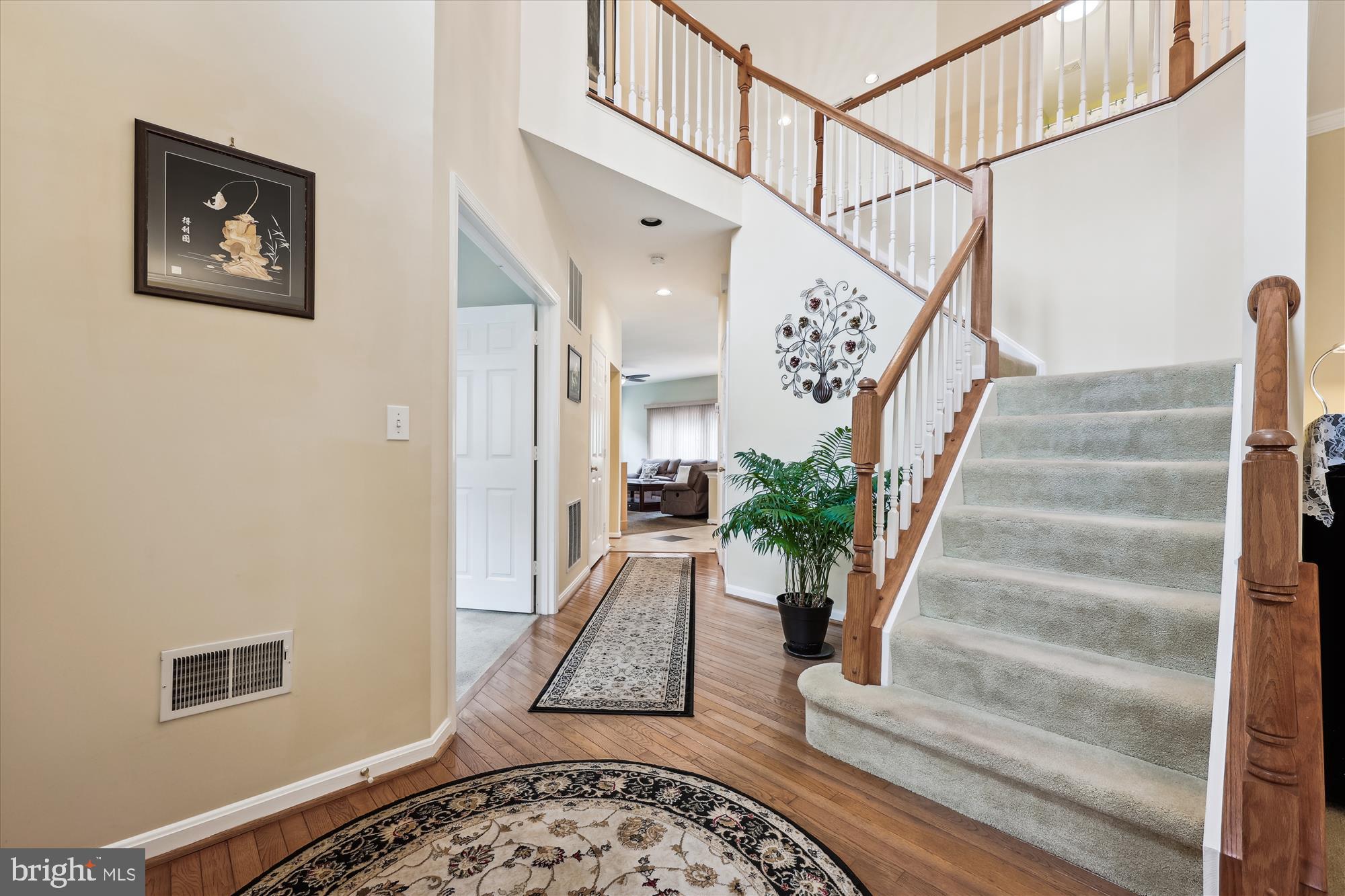 18717 Severn Road Gaithersburg, MD 20879 - Photo 7 of 44 a view of staircase with white walls and a rug