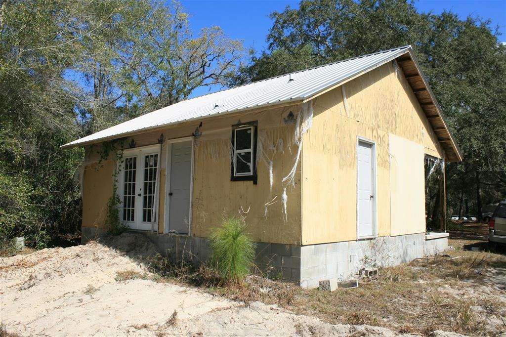 108 Chiappini Farm Road Hawthorne, FL 32640 - Photo 1 of 1 UNFINSHED HOUSE & 10 ACRES
