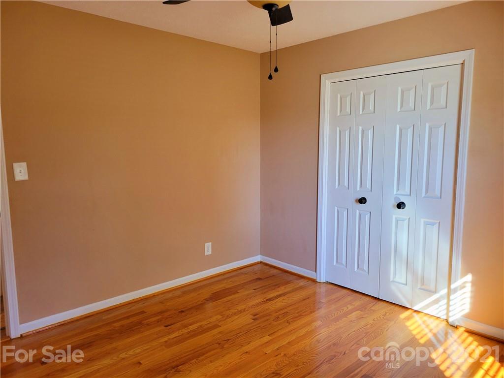3411 Fallston Road Shelby, NC 28150 - Photo 19 of 39 a view of an empty room with wooden floor
