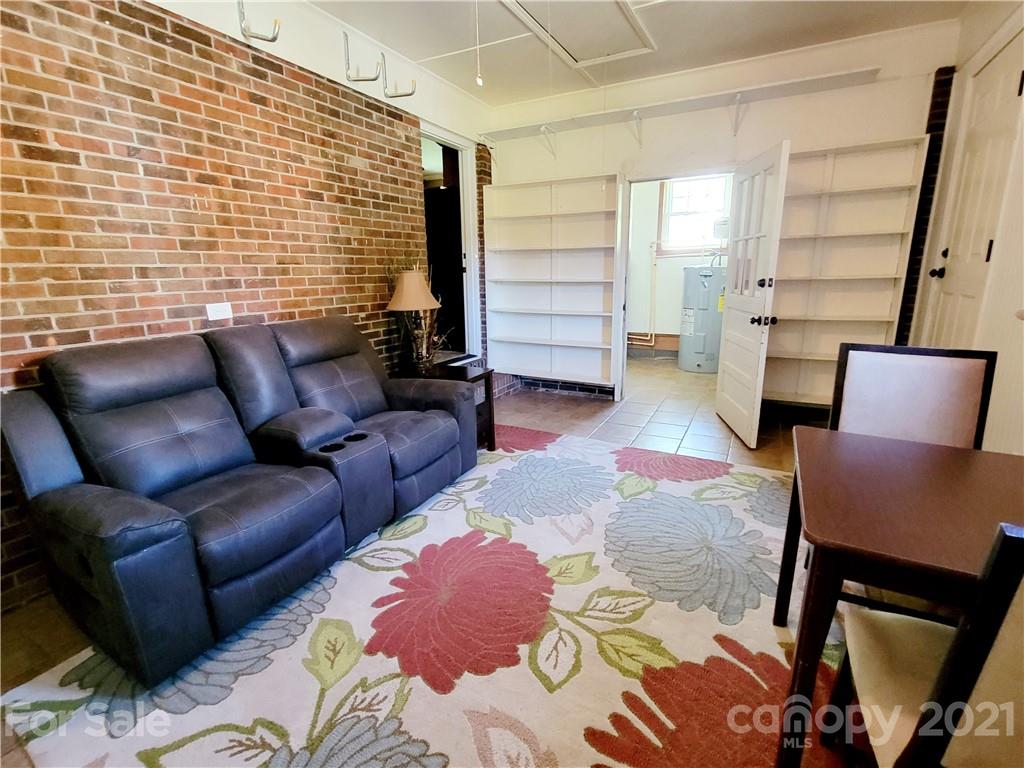 3411 Fallston Road Shelby, NC 28150 - Photo 23 of 39 a hotel room with furniture and stairs