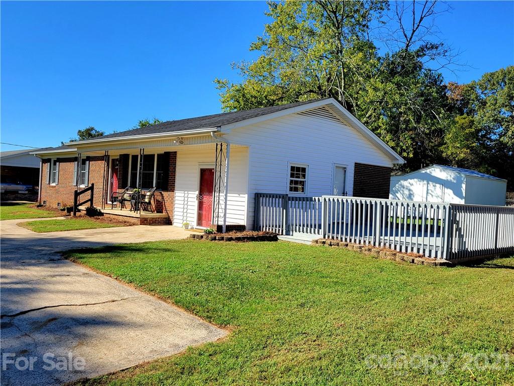 3411 Fallston Road Shelby, NC 28150 - Photo 28 of 39 a view of a house with backyard and porch