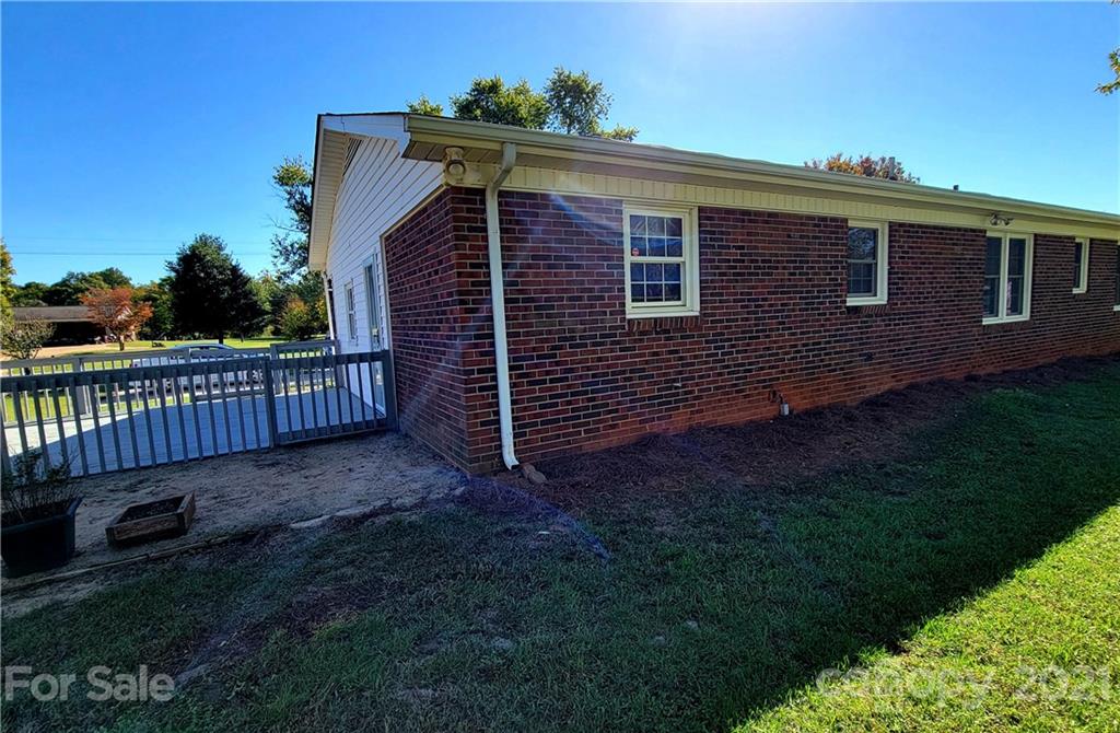 3411 Fallston Road Shelby, NC 28150 - Photo 30 of 39 a view of a house with a yard