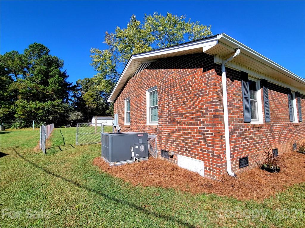 3411 Fallston Road Shelby, NC 28150 - Photo 32 of 39 a front view of a house with a yard