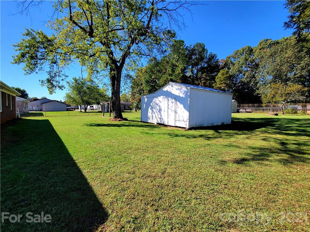3411 Fallston Road Shelby, NC 28150 - Photo 38 of 39 a view of a backyard with large trees