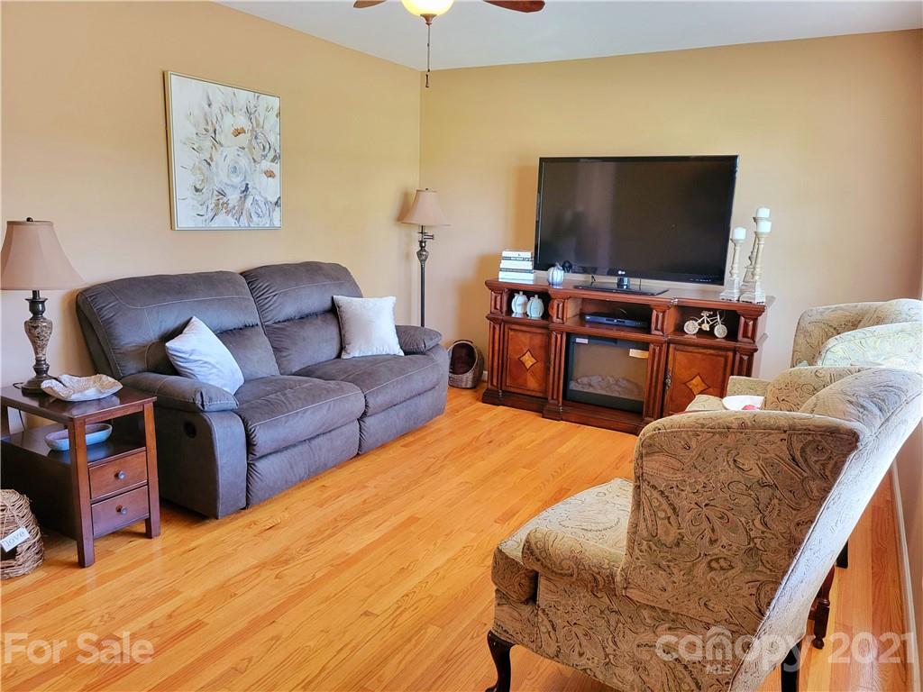 3411 Fallston Road Shelby, NC 28150 - Photo 5 of 39 a living room with furniture and a flat screen tv