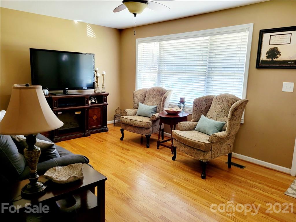 3411 Fallston Road Shelby, NC 28150 - Photo 7 of 39 a living room with furniture and a flat screen tv