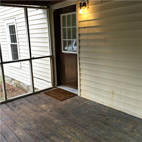 950 Bugscuffle Road Wartrace, TN 37183 - Photo 9 of 12 The screened-in side porch is a perfect place for grilling out!