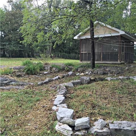 950 Bugscuffle Road Wartrace, TN 37183 - Photo 10 of 12 This scenic backyard is perfect for kids and entertaining.