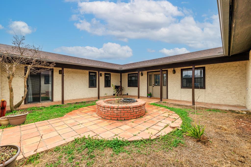 a house view with a garden space
