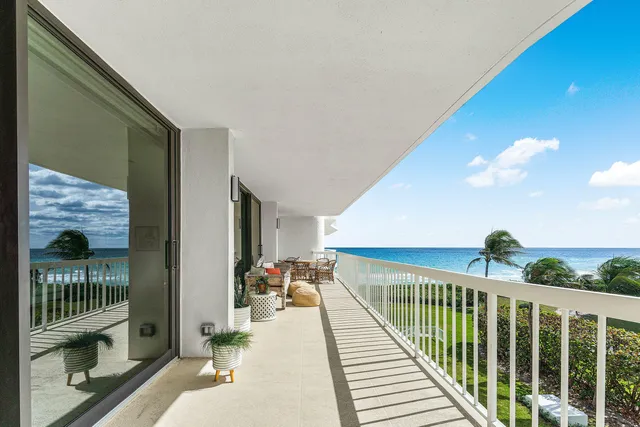 a lobby with furniture and a rug