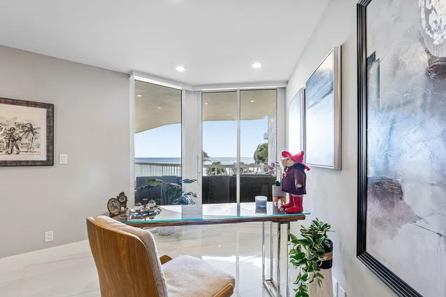 a kitchen with stainless steel appliances kitchen island granite countertop a sink and cabinets