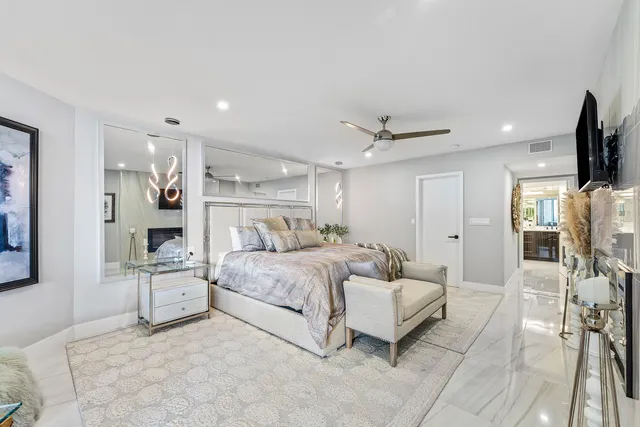 a balcony with table and chairs