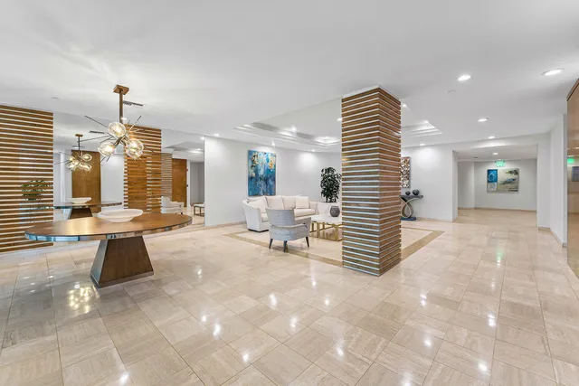 a living room with furniture and white walls