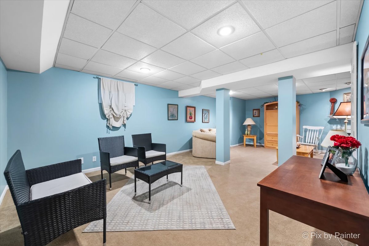 705 Cherry Tree Lane Genoa, IL 60135 - Photo 15 of 31 a living room with furniture and wooden floor
