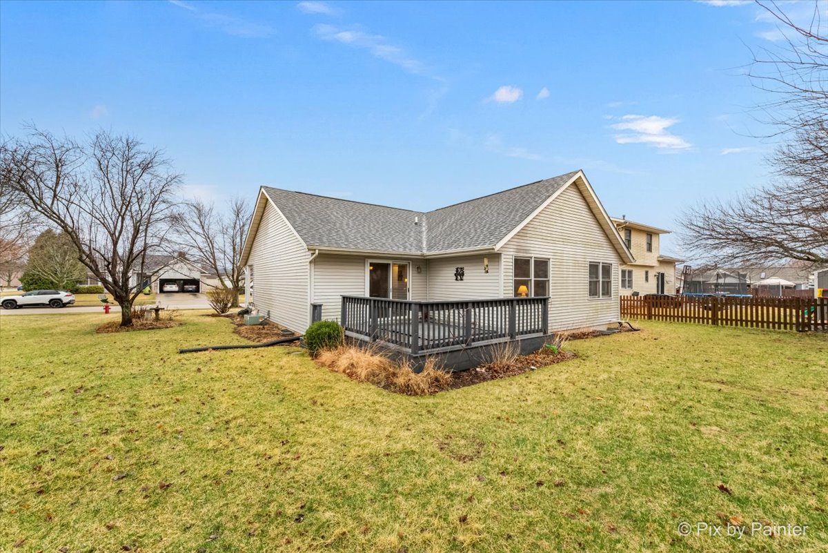 705 Cherry Tree Lane Genoa, IL 60135 - Photo 21 of 31 a view of a house with swimming pool and sitting area